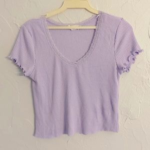 Light pastel purple top. Size medium.